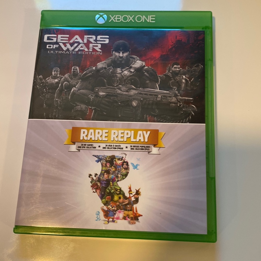 2 in one Xbox one disks containing Gears of War ultimate edition and Rare Replay
